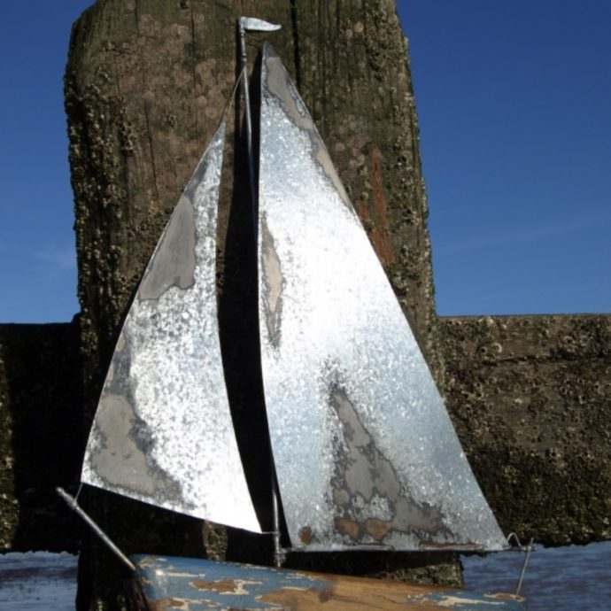 Tin yacht wall art